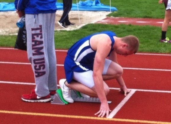 Sprinter Matt McMillan prepares to take off on his run to 300 hudles gold yesterday at the ICC meet.