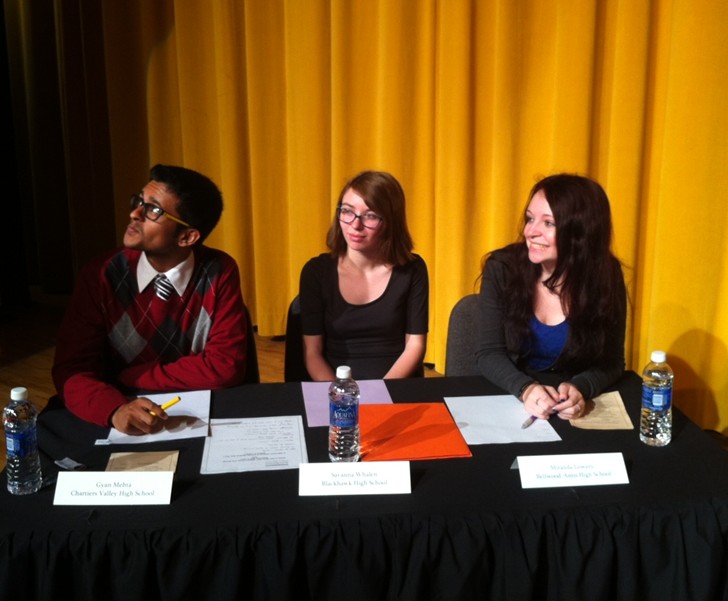 Miranda Lowery gets extra instruction from debate moderator Gordon Mitchell before the annual CHS public forum at North Allegheny High School.