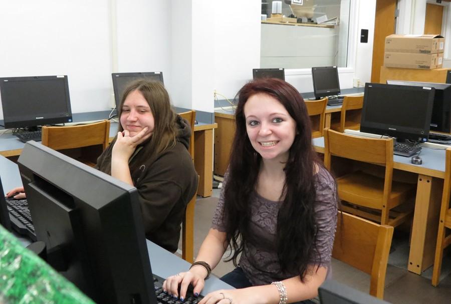 Valedictorian Angela Wheeler, left, and Salutatorian Miranda Lowery (right) were hard at work today making some last-minute adjustments to their commencement speeches before a rehearsal in the auditorium.