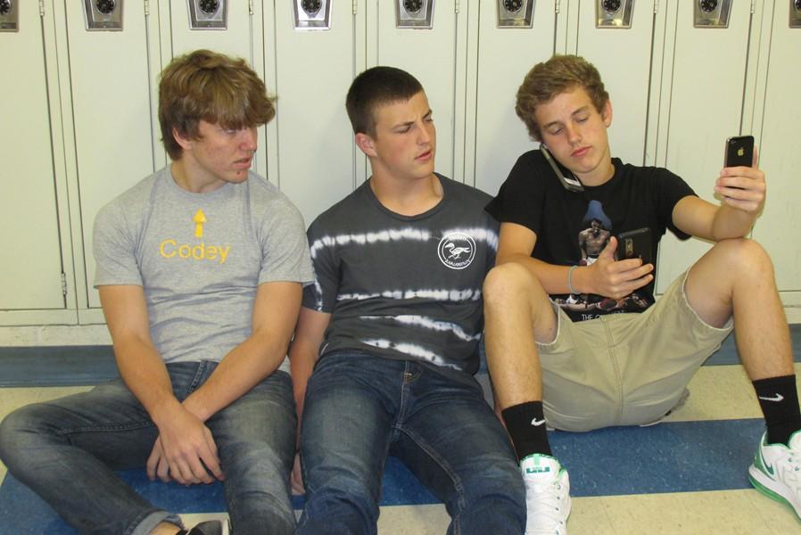 B-A juniors Codey Campbell (left) Nate Claar (middle) and Noah Burns (right) have different levels of cell phone dependency.