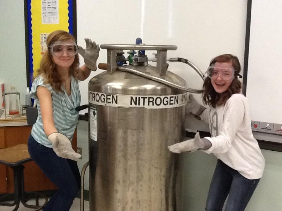 Eighth+grade+students+Morgan+Delozier+and+Cassidee+Reiterhad+the+opportunity+to+experiment+with+a+huge+liquid+nitrogen+tank