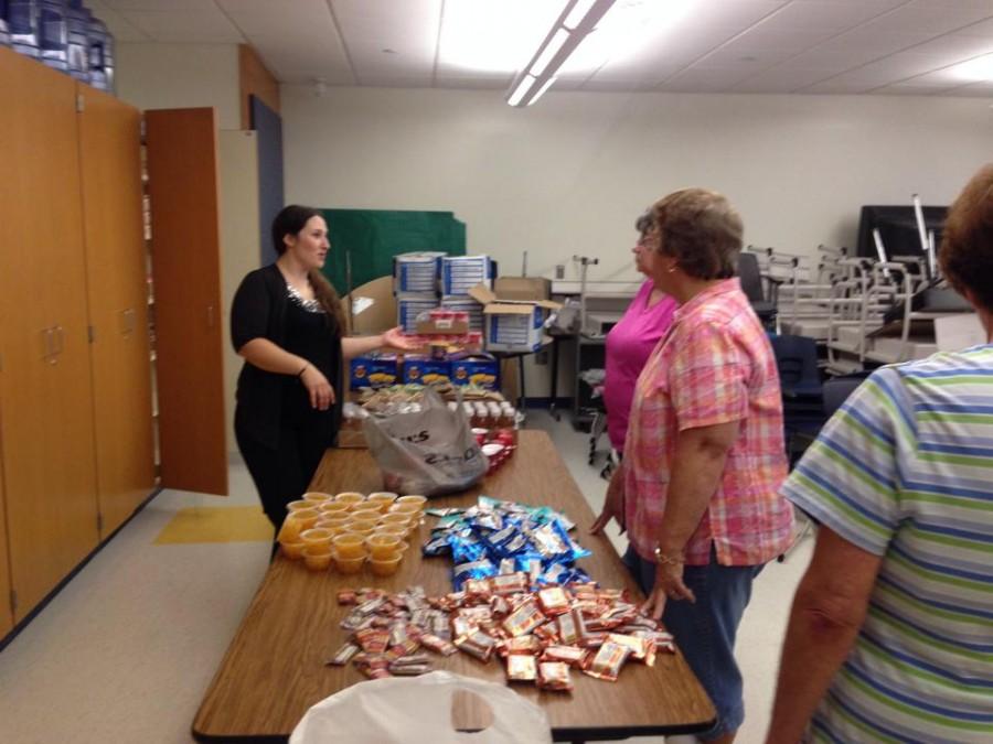 Parents have been a driving force behind the Blue Devil backpack program, with many volunteering time to fill the bags each week.