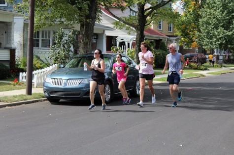 Competitors ran the neighborhoods of Bellwood and raised money for breast cancer research.