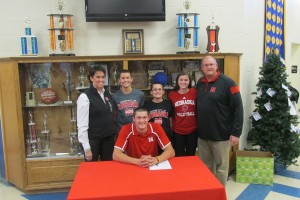 Chad, pictured with his family, chose D-1 Nebraska for his pitching talents.