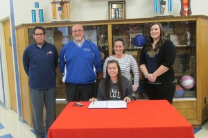 Ana, pictured with her basketball coaches, selected the University of Pittsburgh-Johnstown.