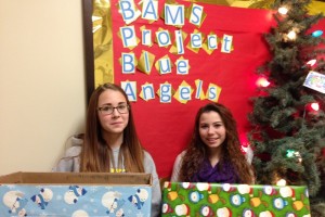 Middle school students Alexis Halvorsen and Paie Wenner take part in the Blue Angels project.