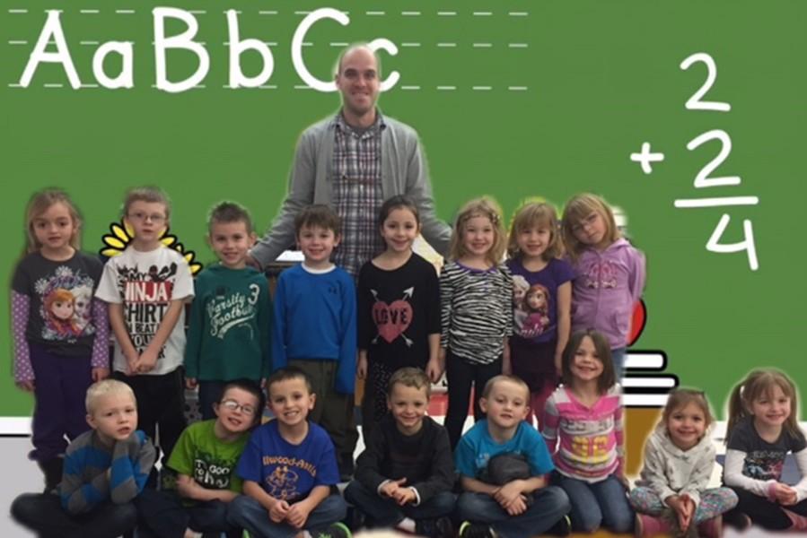 Mr. Germino poses with his kindergarten class