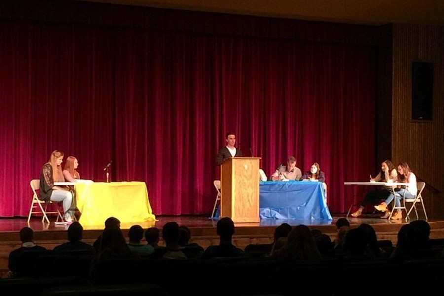 Senior+Ian+Schmoke+takes+the+podium+as+the+first+speaker+in+his+debate+Monday+at+the+annual+CHS+school-wide+debates.