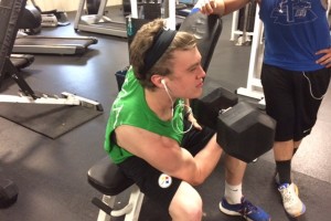 Ethan McGee had his ear buds pumping as he pumped his bi's with 100-pounders.