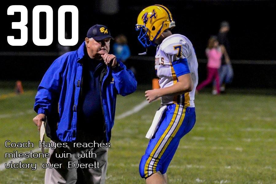 Coach John Hayes relays a play in with quarterback Jarrett Taneyhill against Everett. Taneyhill was sharp once again as B-A got Coach Hayes career win No. 300.