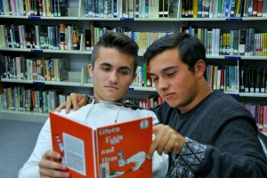 Brennan McKendree reads a story to his pal Nick Mallory, not because Nick can't read but because it's nice.