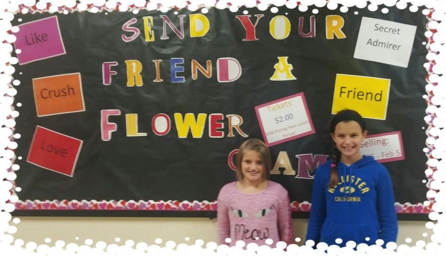 Student Council members created a Flowergram bulletin board for the middle school hallway.