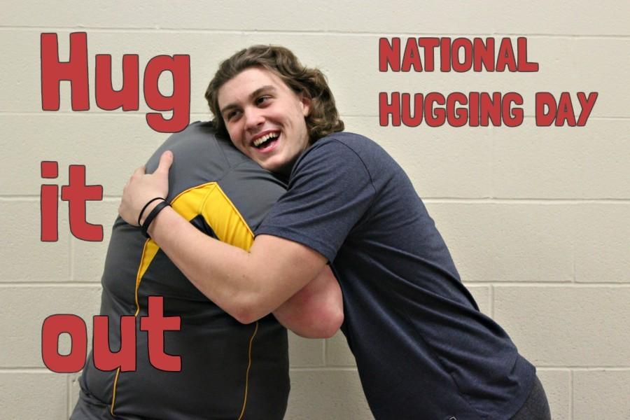 Ethan McGee and Jason Shade opt for the classic embrace on National Hugging Day.