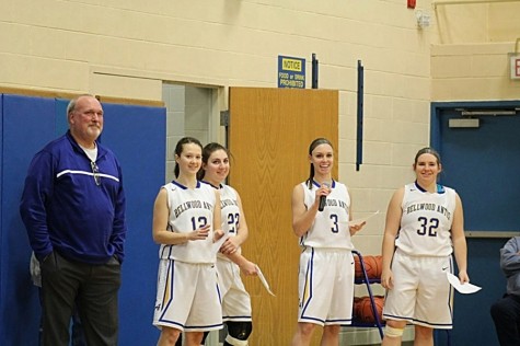 Coach Jim Swaney received a plaque prior to the Claysburg-Kimmel game to recognize his 400th victory.
