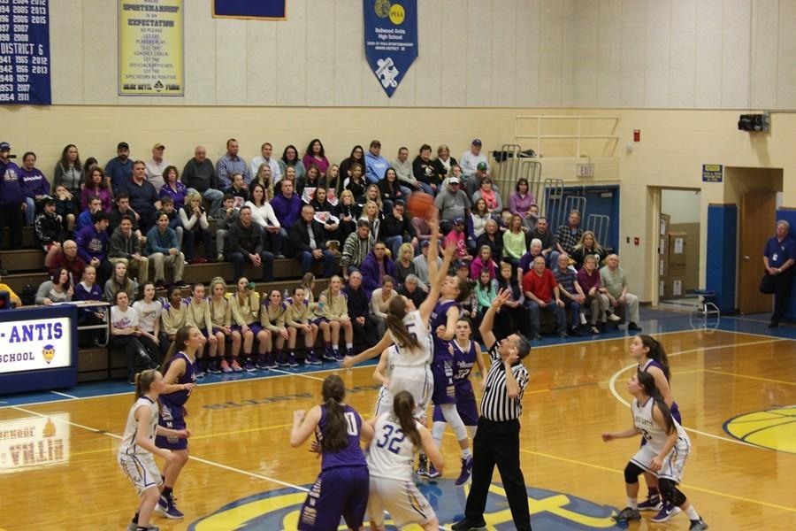 Sophie Damiano jumps for the tip-off.