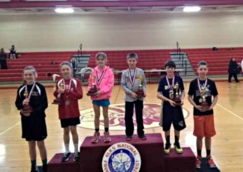 Holden Schreier stands atop the podium at Bellefonte Area High School as the 2016 Elks Hoop Shoot Pennsylvania champion.