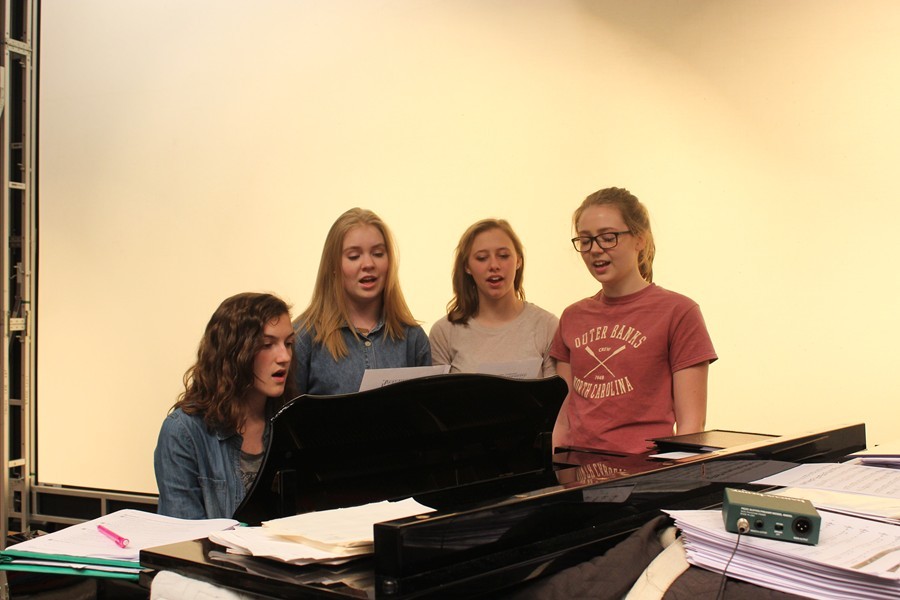 Stephanie Mills, Grace Misera, Addison Clemente, and Hailey McCloskey sing in the auditorium during a study hall. Its one of the many ways B-A students benefit from music during the school day.