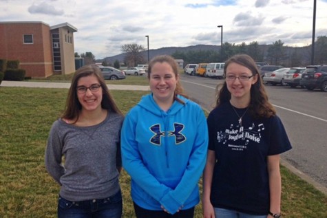 Sarah Knisely, Kyra Woomer, and Katlyn Farber prepare to head to practice at Juniata Valley in preparation for Region III band.