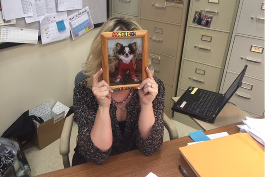 Spanish teacher Mrs. Smith is definitely an animal lover who takes a stand against animal cruelty. Shes shown here with her beloved dog, Chi CHi.