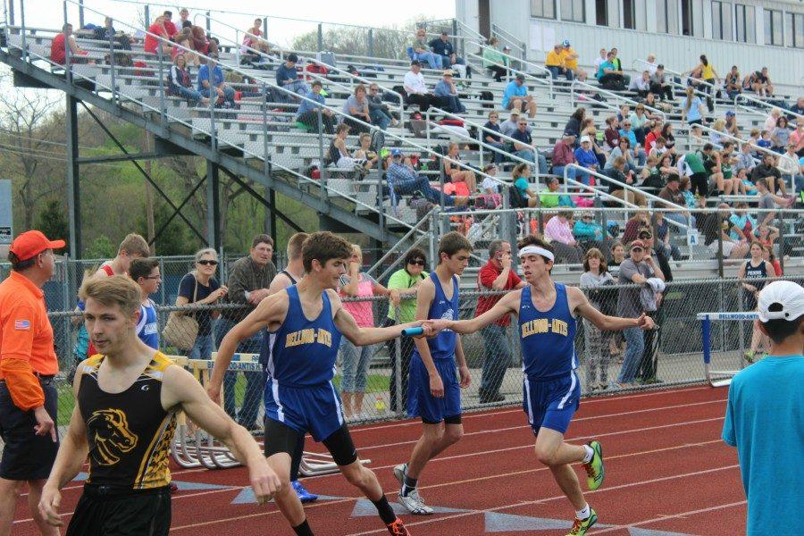 Robert VanKirk takes the handoff from Brayton Coover. (Christina Kowalski)