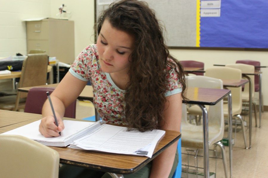 Brooke Beichler works hard in study hall to complete her homework.