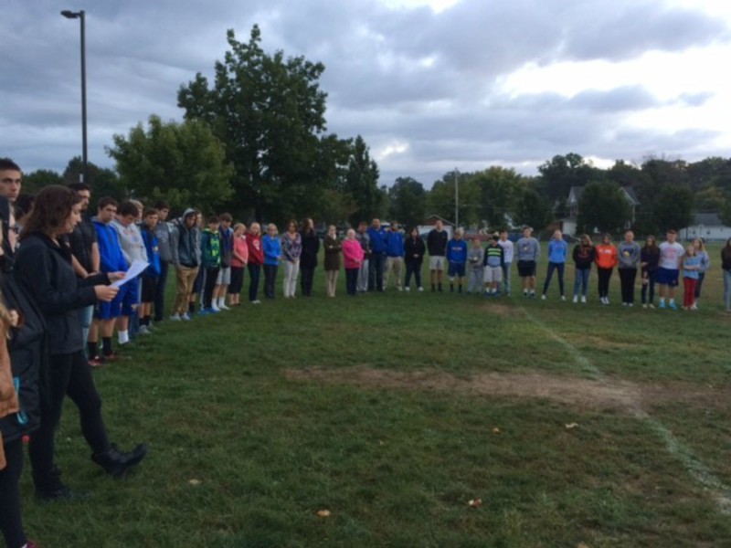 Stephanie Mills leads the FCA in prayer at the annual See You at the Pole event in October.
