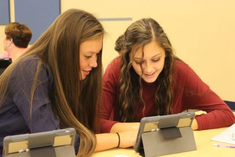 Tina Hollen and Ali Dumin were two members of the student SWAT team that attended iPad training.