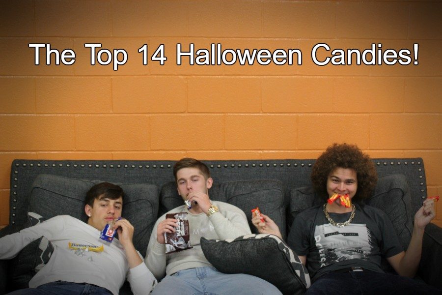 Thor Schmittle, Trevor Snyder and Hunter Taylor all enjoy a little bit of the Halloween candy.