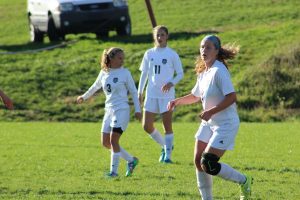 Freshman Jaydyn Shuke keeps her eyes on the play.