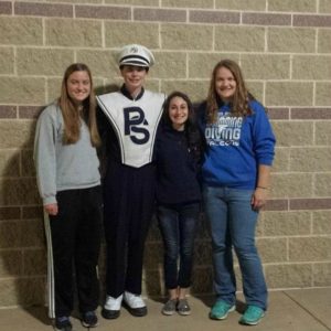 Dylan Albright poses with his sister Amanda (to his immediate left) and friends at Beaver Stadium.