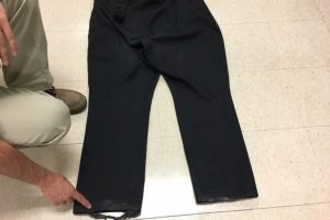 The current band pants are torn at the edges, with hems tearing away from the pants after 15 years of use.