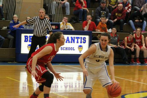Alanna Leidig looks for room to drive in the Lady Devils win last night over Everett.