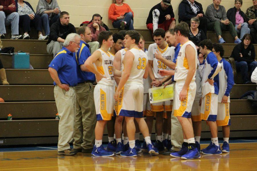 The Blue Devil basketball team makes some adjustments during a timeout in their victory over Tussey Mountain.