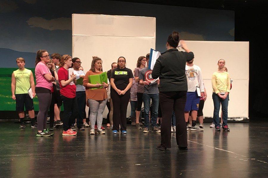 Director Rachel Wagner works with the Footloose cast at a recent rehearsal.