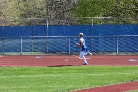 Boys track team continue rolling, girls stay going positive