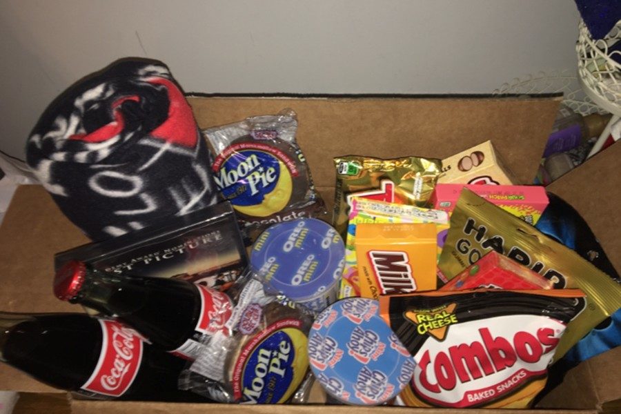 Senior Allison McCaulley used a box of her boyfriends favorite things as part of her promposal.