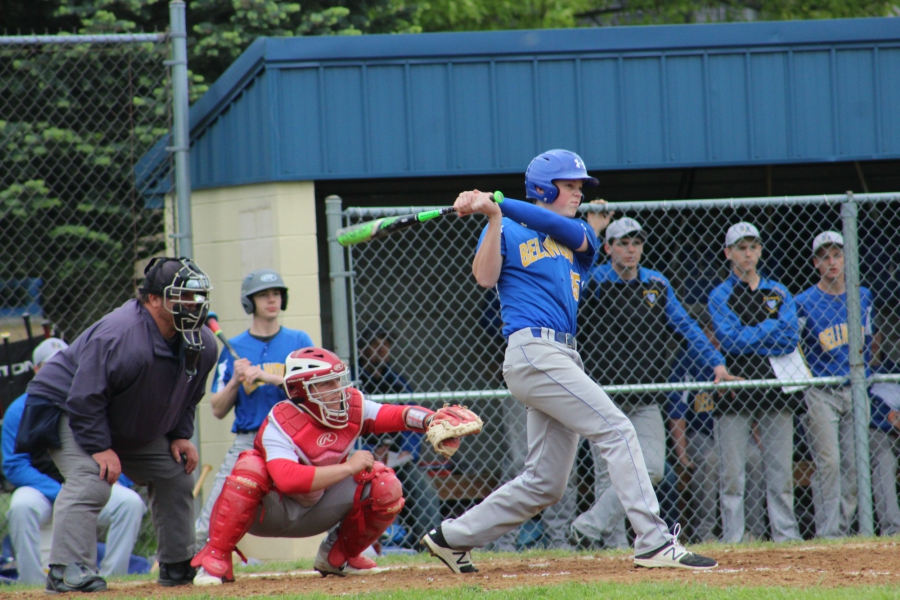 Trent Walker smacks one of his two hits against Everett.