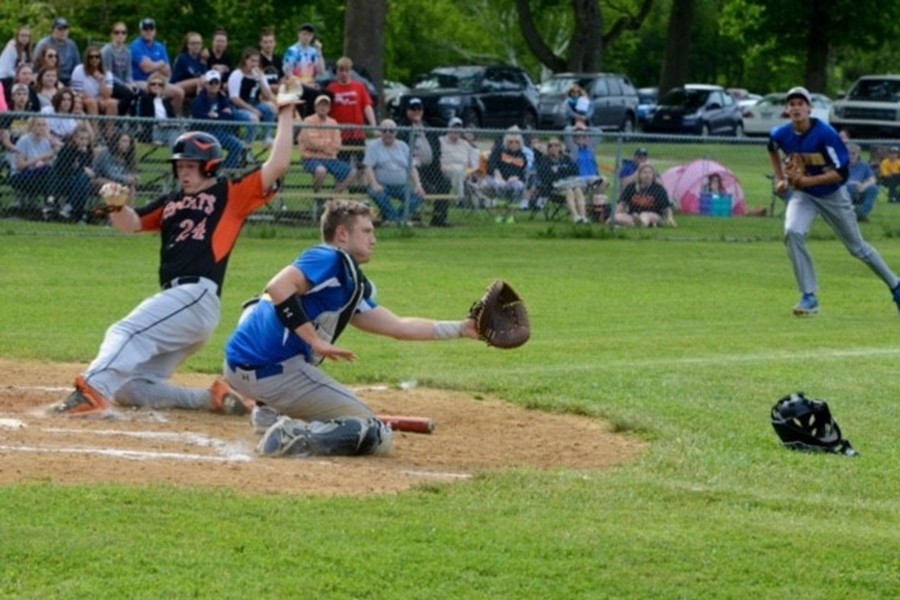 Sawyer Kline looks to make a play at the plate yesterday against Blairsville.