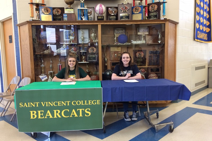 Lindsey Southworth (left) and Makayla Carles (right) signed to play their favorite sports in college last Friday.