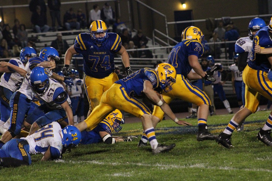 Eric Morder fights for yardage in the Blue Devils' ICC win over Claysburg-Kimmel.
