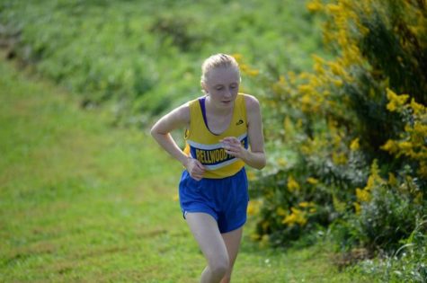 Jenna Bartlett rinds it out up the challenging hill on Tyrones cross country course. Jenna won the race by more than a minute.
