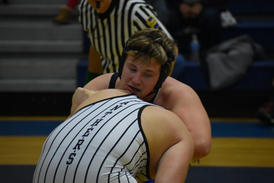 Evan Pellegrine works for positioning in a match against Northern Bedford.