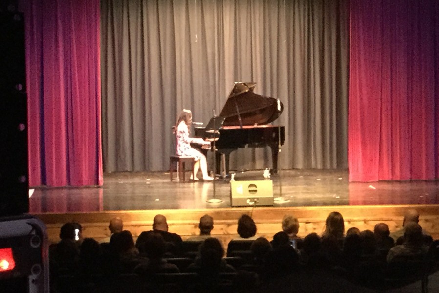 Malia Danish plays piano at the 2017 Variety Show.