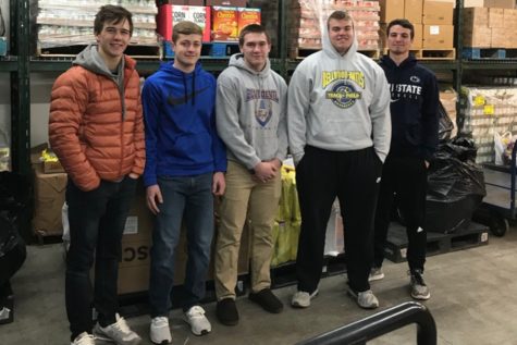 FCA members Tanner Worthing, Dylan Wilson, Jordan Moore, Chris Wertman and Max DeArmitt helped deliver 1,000 cereal boxes to the food pantry.