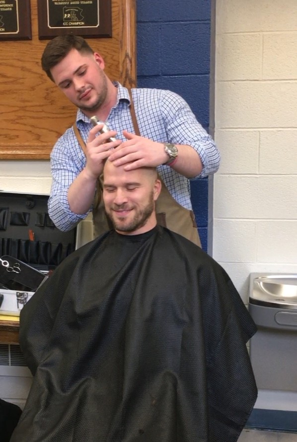 Mr. Naylor had his head shaved bald at THON. The original bet was a haircut for $5,000 raised, but the THON committee more than doubled that.