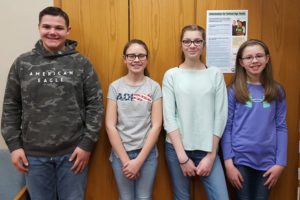 Middle school Students of the Week include, from left to right:
Dominic Caracciolo, Mara Bollinger, Carena Eamigh, and Jenn Norton.

