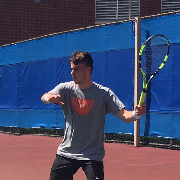 Exchange student Paul Lemaire readies a forehand volley in the District 6 2A championship.