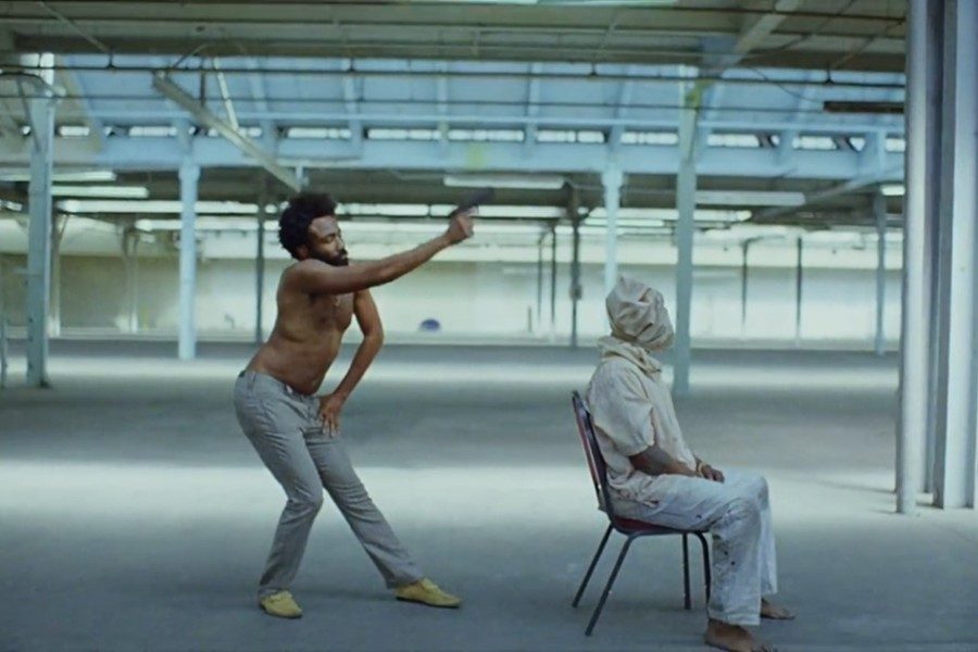 The first 55 seconds of the song This is America set the tone for a moving music video.