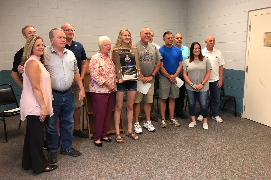 Alli Campbell was flanked by family, coaches and friends when she donated her $1,000 Play it Forward grant to the Northern Blair County Recreational Center..
