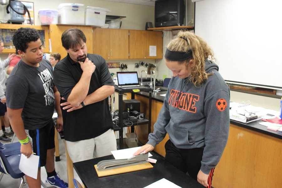 Mr. Goodman works with certified stapler Jayden Shuke. 